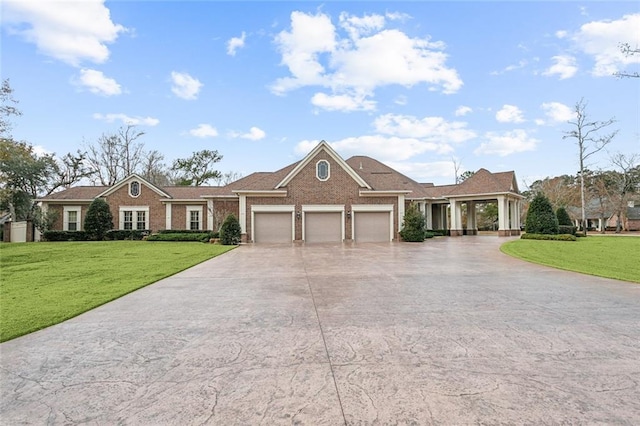 ranch-style house with a garage and a front yard