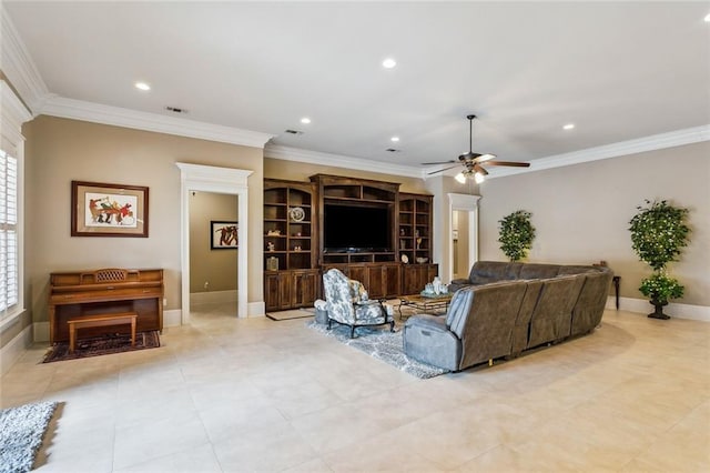 living room featuring ornamental molding and ceiling fan