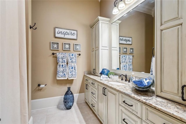 bathroom with tile patterned floors and vanity