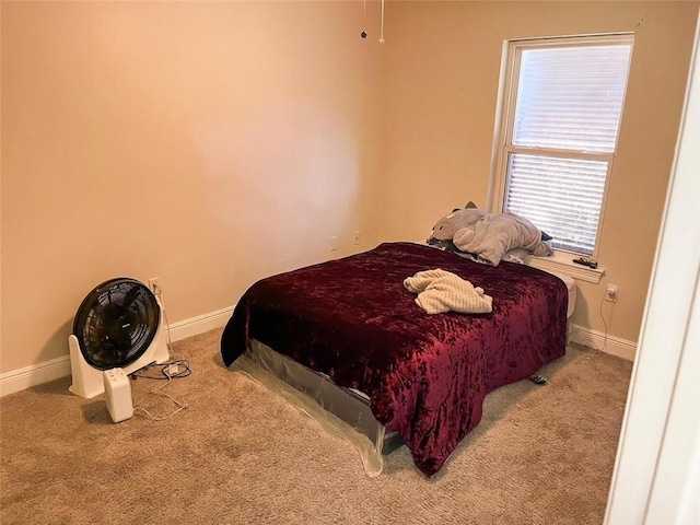 bedroom with light carpet