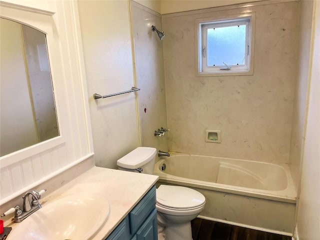 full bathroom featuring shower / tub combination, vanity, and toilet