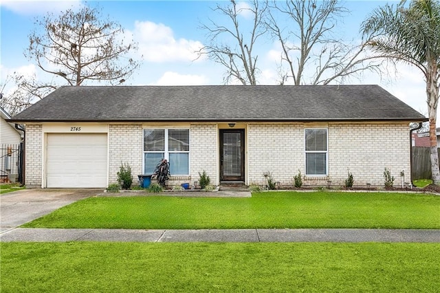 single story home with a garage and a front lawn