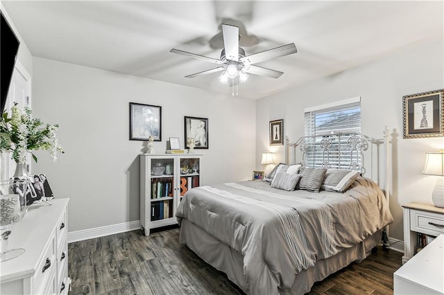 bedroom featuring dark wood-type flooring and ceiling fan