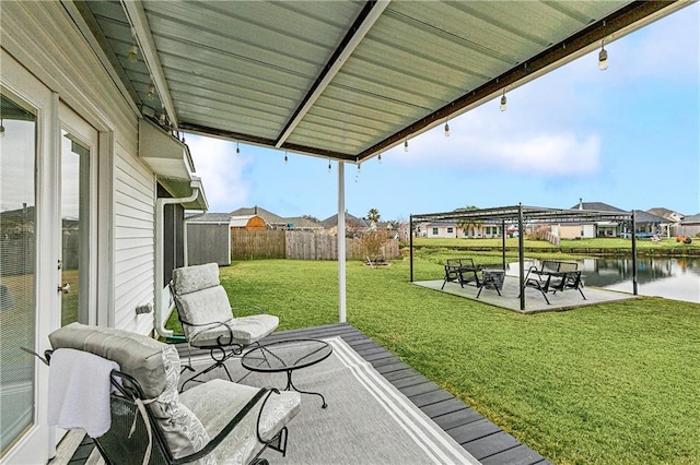 view of patio / terrace featuring a water view