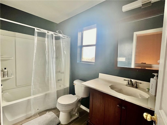 full bathroom featuring vanity, shower / bath combination with curtain, and toilet