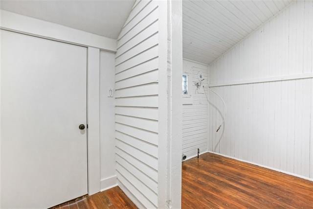 laundry room featuring dark wood-type flooring