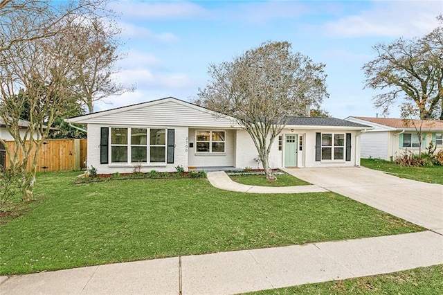 ranch-style house with a front lawn