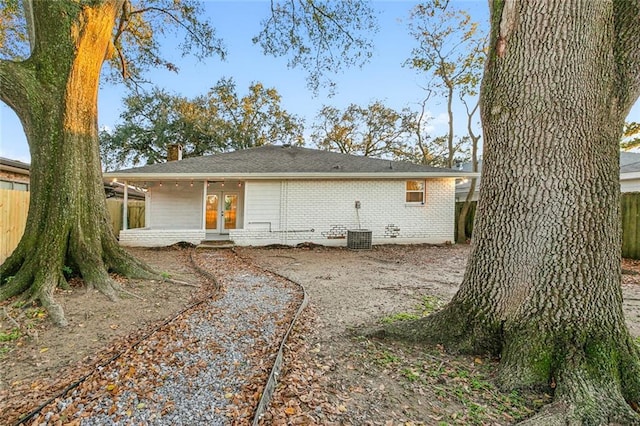 back of property featuring french doors