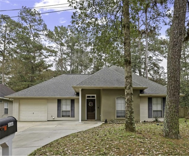 ranch-style house featuring a garage