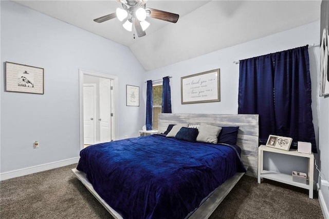 bedroom with dark carpet, vaulted ceiling, and ceiling fan