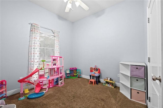 recreation room with ceiling fan and carpet floors