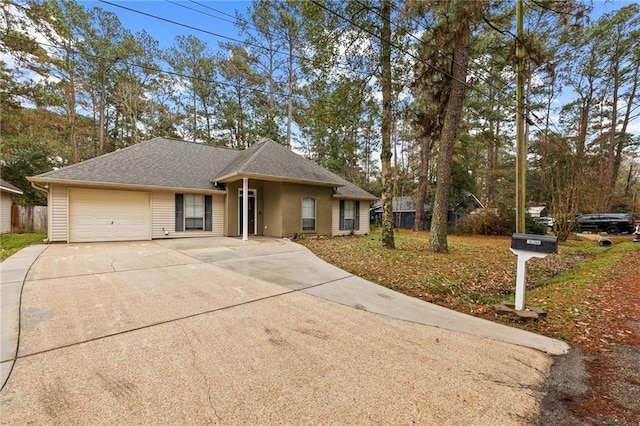 single story home featuring a garage