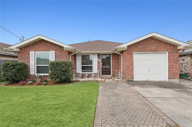 ranch-style house with a garage and a front yard