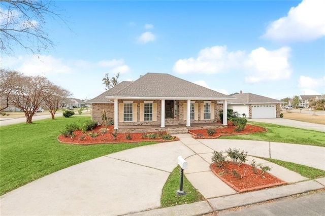 ranch-style home with a garage, covered porch, and a front lawn