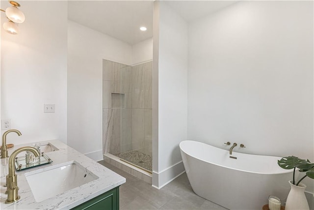 bathroom featuring vanity, tile patterned floors, and independent shower and bath