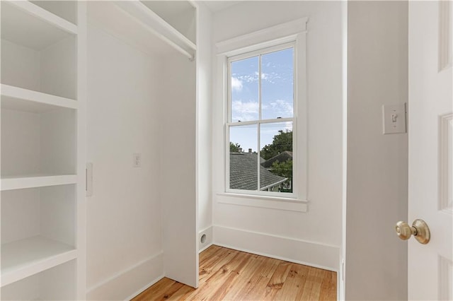 spare room featuring hardwood / wood-style floors