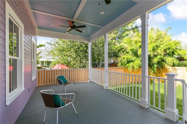 view of patio / terrace with ceiling fan and a porch