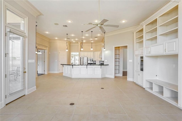 unfurnished living room with ceiling fan, ornamental molding, and light tile patterned floors