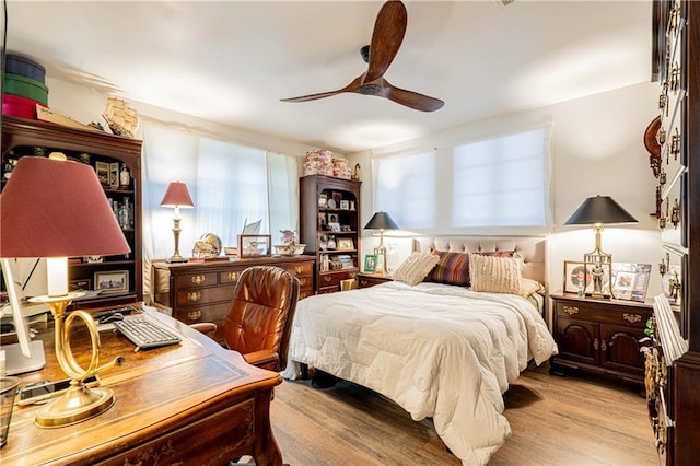 bedroom featuring ceiling fan and light wood-type flooring