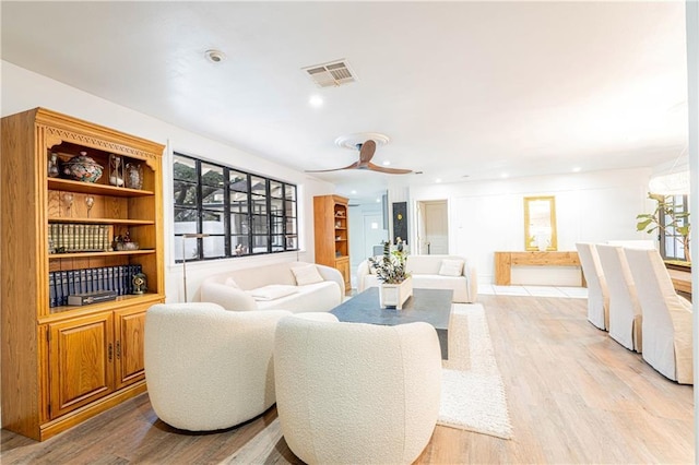 living room with light hardwood / wood-style floors