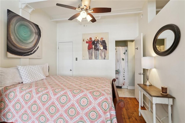 bedroom featuring ceiling fan and dark hardwood / wood-style floors