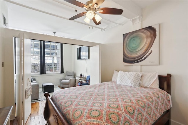 bedroom featuring ceiling fan and light hardwood / wood-style floors