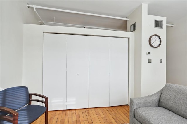 living area featuring light hardwood / wood-style flooring