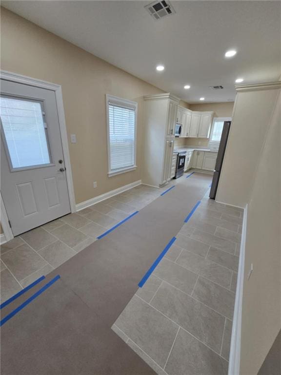 interior space featuring light tile patterned flooring