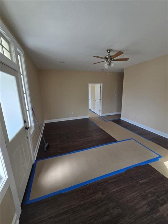 entryway featuring dark hardwood / wood-style flooring and ceiling fan