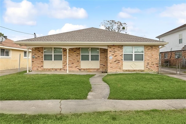 view of front of home with a front lawn