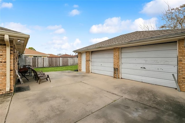 garage with a lawn