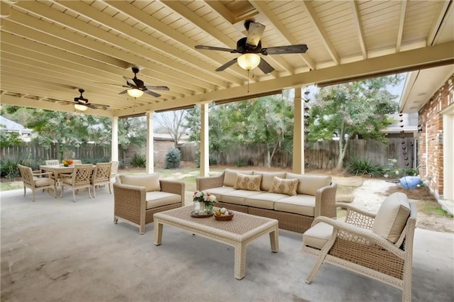 view of patio / terrace with an outdoor living space and ceiling fan