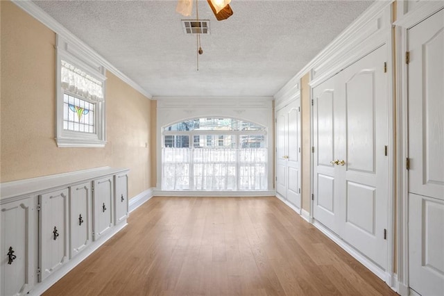 interior space featuring a wealth of natural light and ceiling fan