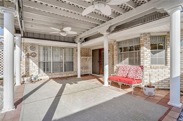 view of patio / terrace featuring ceiling fan