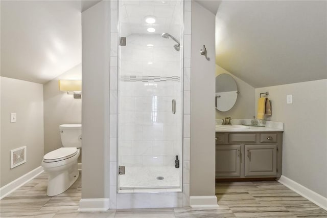 full bathroom featuring visible vents, vanity, toilet, baseboards, and a stall shower