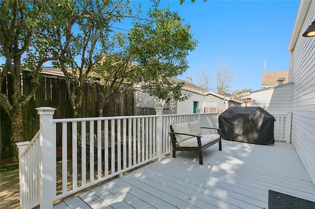 wooden terrace with area for grilling