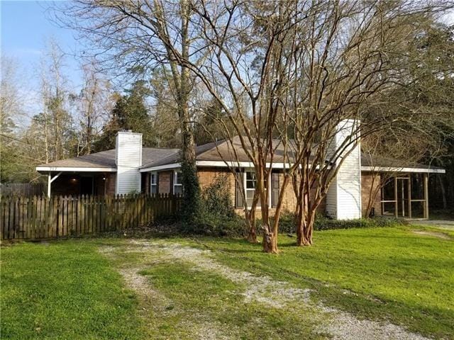 view of yard with a carport