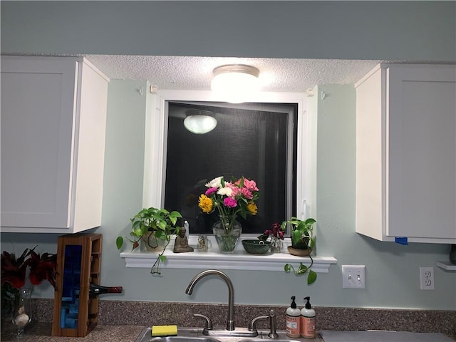 room details with sink and white cabinets