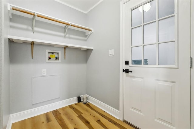 laundry area featuring washer hookup and wood-type flooring