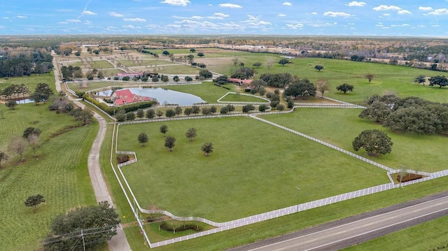 bird's eye view featuring a water view and a rural view