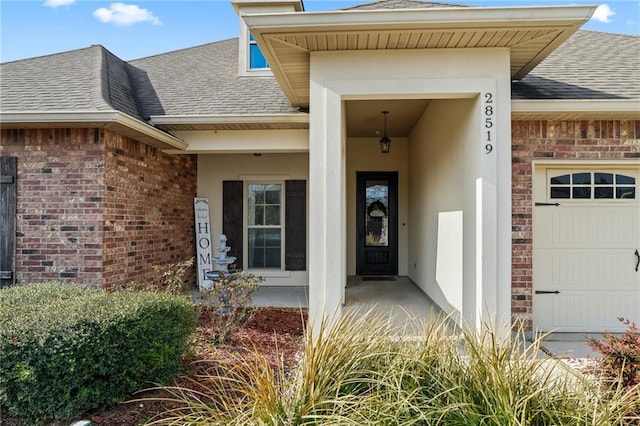 property entrance featuring a garage