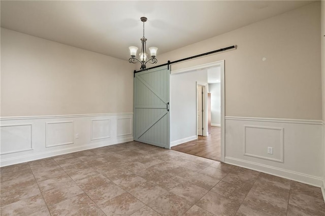 empty room featuring a barn door