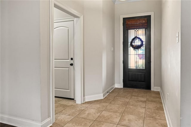 entryway with light tile patterned floors