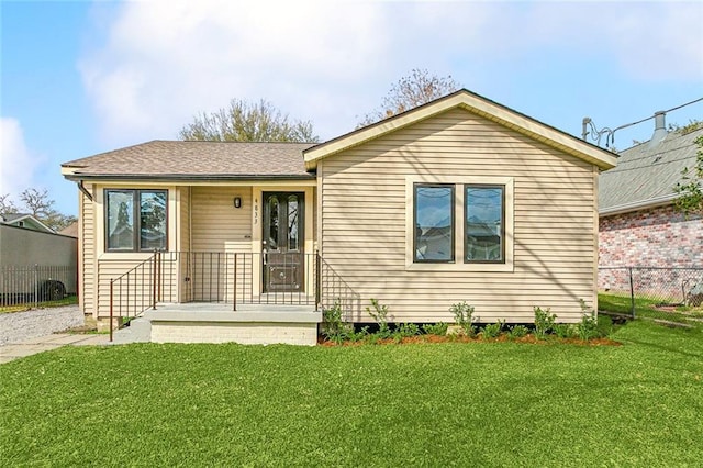 bungalow with a front lawn