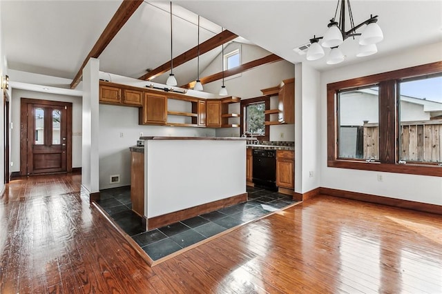 kitchen with dark hardwood / wood-style flooring, decorative light fixtures, a wealth of natural light, and black dishwasher