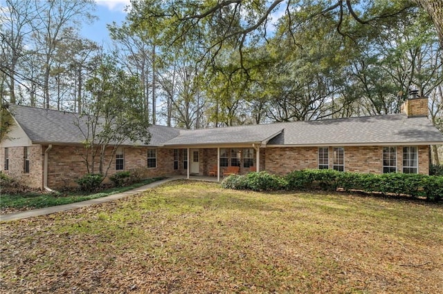 ranch-style house with a front yard