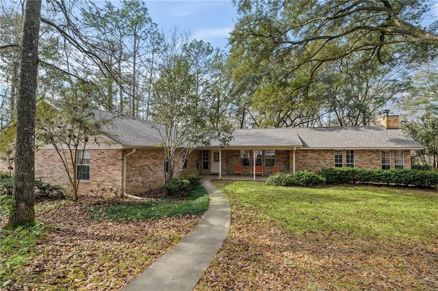 single story home featuring a patio area and a front yard