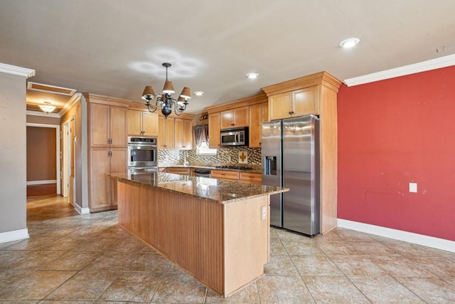 kitchen featuring stainless steel appliances, ornamental molding, a kitchen island, and decorative backsplash