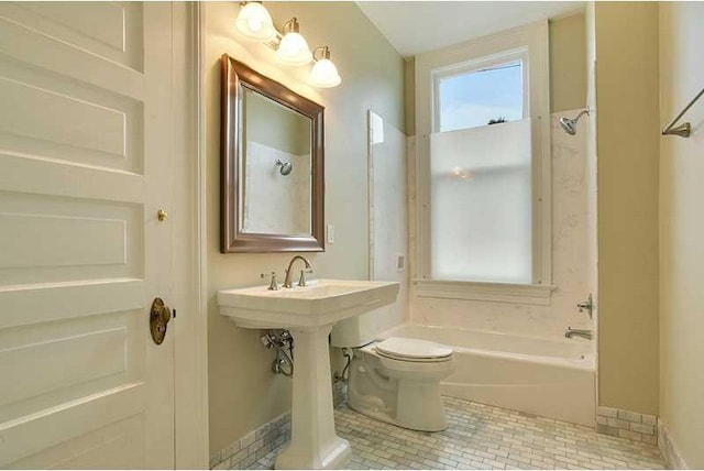 bathroom with tile patterned flooring and toilet