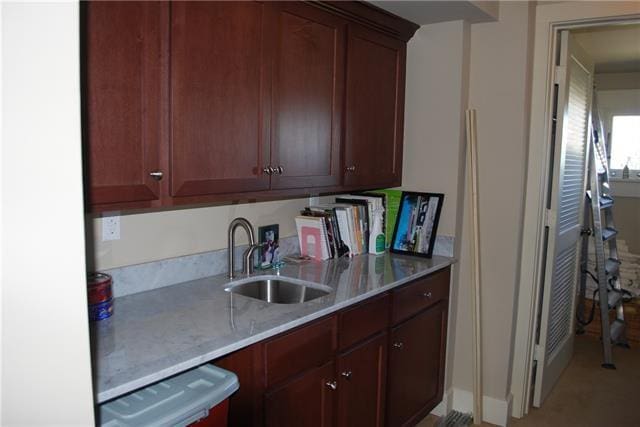 kitchen featuring dishwasher and sink